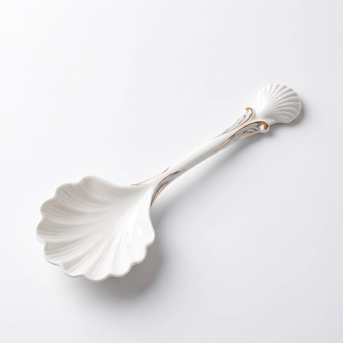 White Shell-Shaped Porcelain Dessert Spoon with Gold Trim
